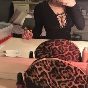 Black lace up long sleeve bodysuit